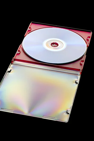 DVD disk na černém pozadí — Stock fotografie