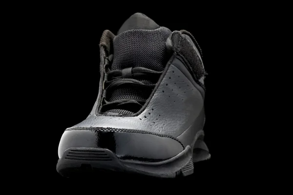 Sportovní obuv na černém makro — Stock fotografie