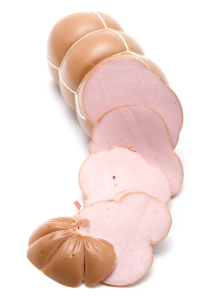 Cutting boiled sausage on white — Stock Photo, Image