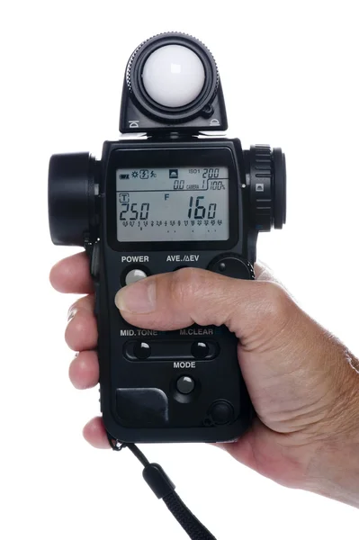 Flash meter on hand — Stock Photo, Image