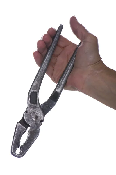 Pliers in hand — Stock Photo, Image