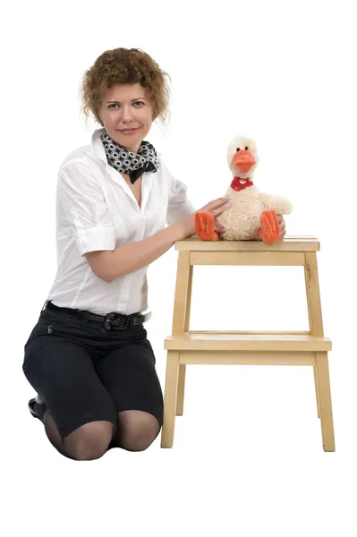Woman and toy on white — Stock Photo, Image