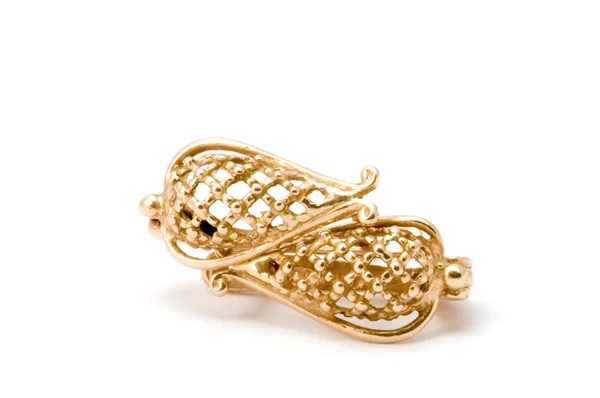 Golden ear-ring — Stock Photo, Image