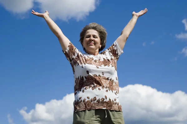 stock image Woman-and-white clouds