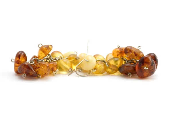 Ear ring with amber — Stock Photo, Image