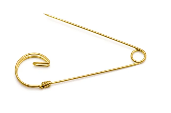 Gold safety pin — Stock Photo, Image