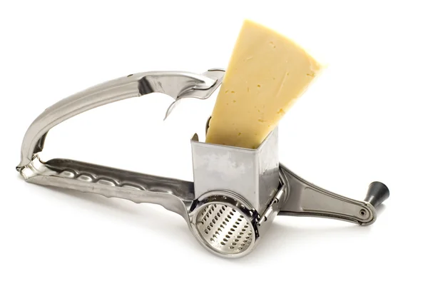 Grater and cheese on white — Stock Photo, Image