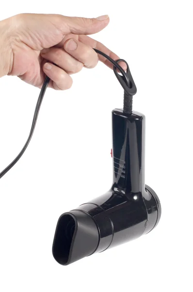 Hair drier in hand — Stock Photo, Image