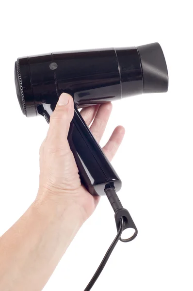 Hair drier on hand — Stock Photo, Image