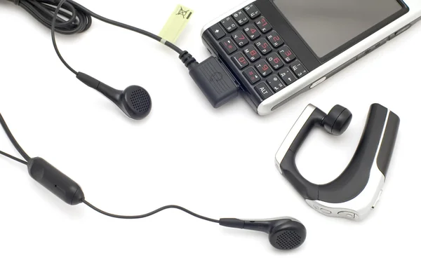 Mobile phones with headset — Stock Photo, Image