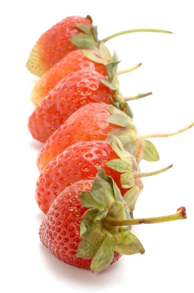 Sladké jahody na bílém pozadí — Stock fotografie