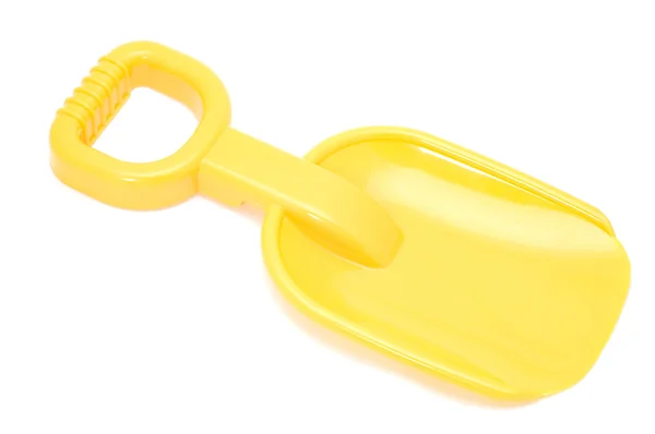 Speelgoed gele spade — Stockfoto
