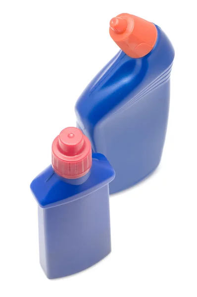 Due bottiglie blu su bianco — Foto Stock