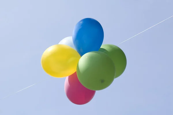 Ballons on blue sky — Stock Photo, Image