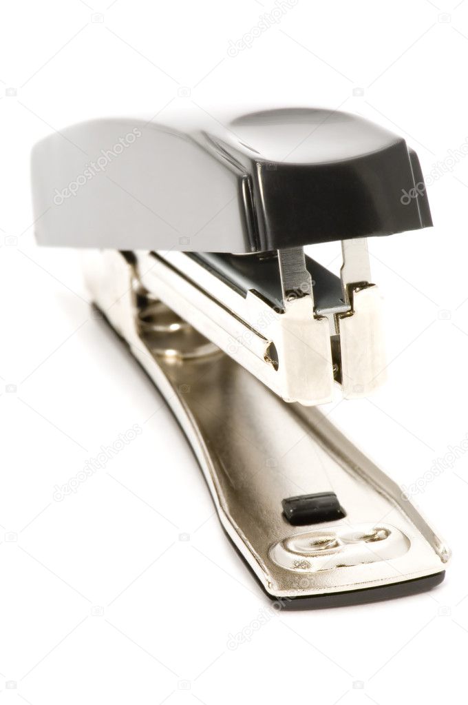 Black stapler on white