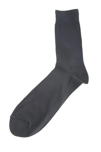 Черные носки на белом фоне — стоковое фото