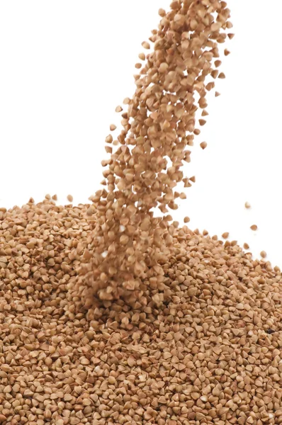 Primo piano di grano saraceno su bianco — Foto Stock