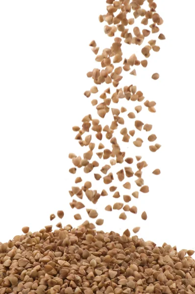 Macro di grano saraceno su bianco — Foto Stock
