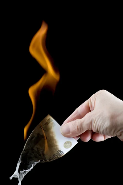 Dinheiro de papel em chamas — Fotografia de Stock