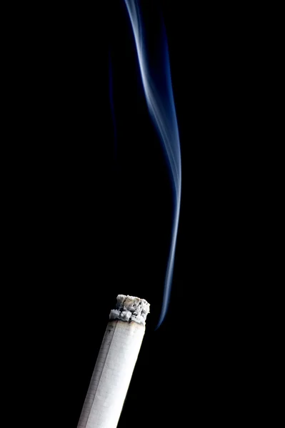 Cigarette with smoke on black — Stock Photo, Image