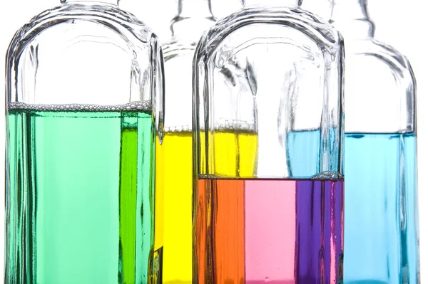 Garrafa colorida com closeup líquido — Fotografia de Stock