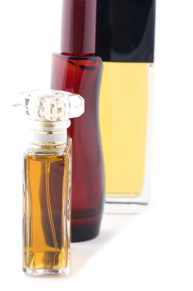 Barevné parfémy láhev — Stock fotografie