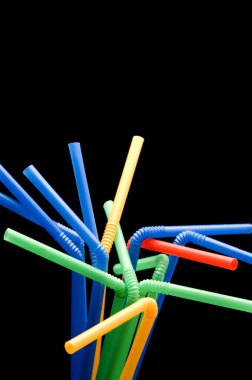 Drinking straw on black clipart