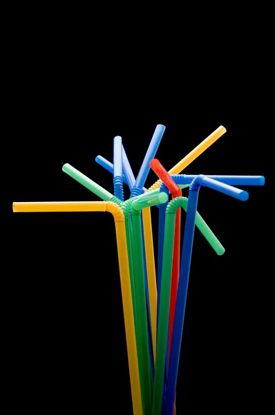 Drinking straws on black macro — Stock Photo, Image