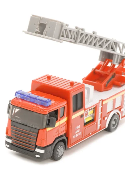 stock image Fire engine closeup on white