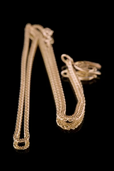 Arany lánc és a Skorpió makró — Stock Fotó