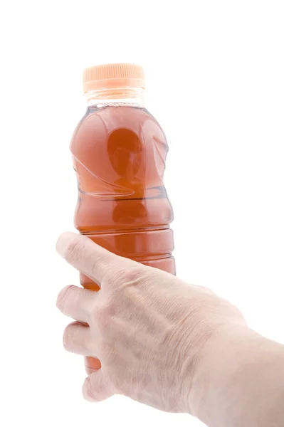 Šťáva láhev s rukou — Stock fotografie