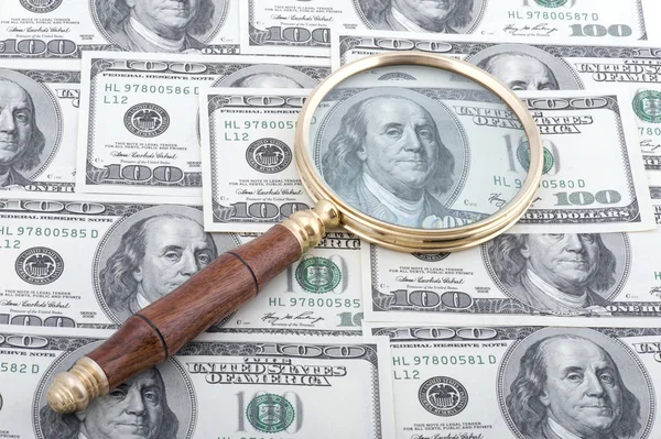 Magnifier with dollar — Stock Photo, Image