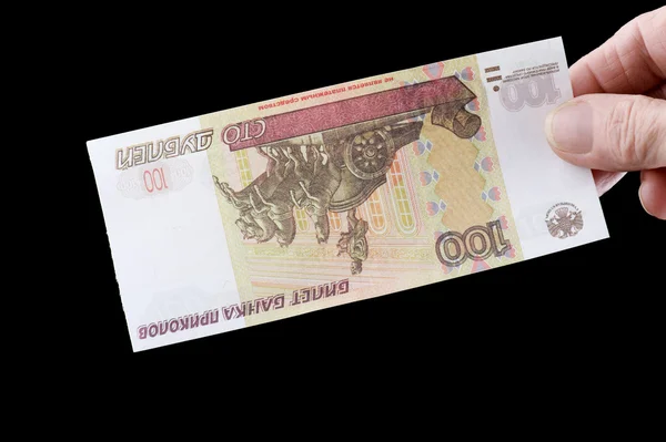 Бумажные деньги макро на черный — стоковое фото