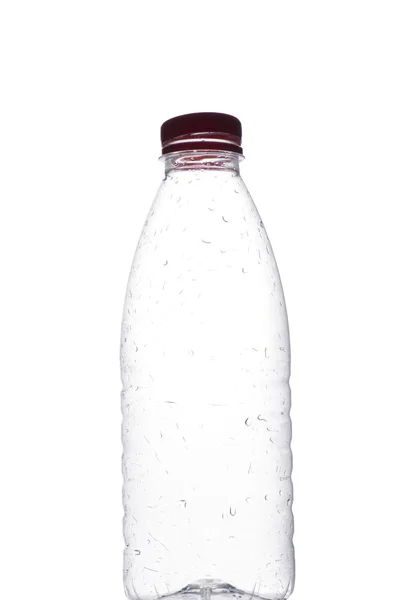 Пластиковая бутылка на белом — стоковое фото