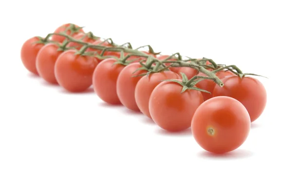 Tomate cru em close-up branco — Fotografia de Stock