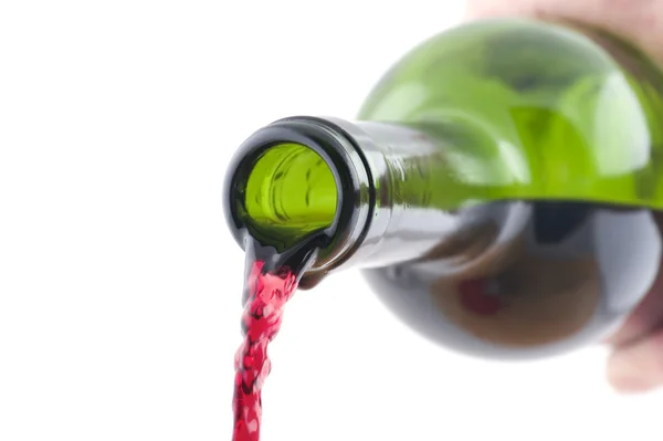 Червона пляшка вина на білому — стокове фото