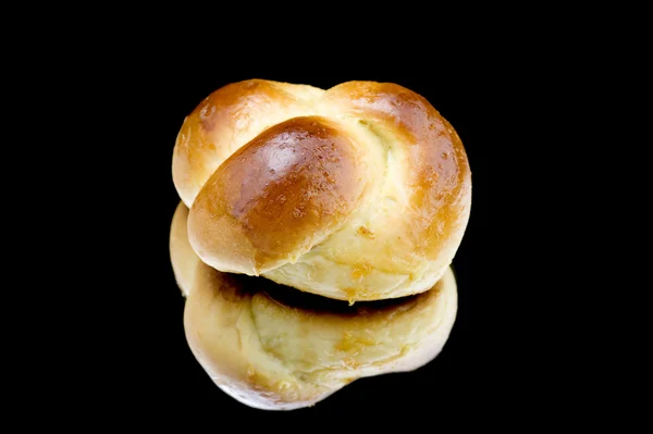 Pequeno pão em preto — Fotografia de Stock