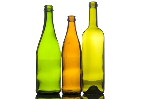 Três garrafas vazias — Fotografia de Stock