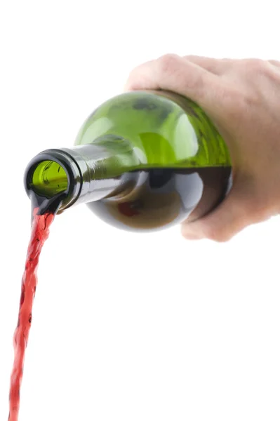 Garrafa de vinho na mão — Fotografia de Stock