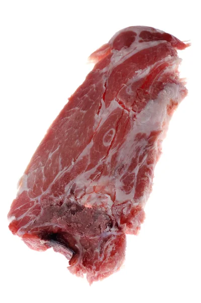 Taglio carne di maiale su macro bianca — Foto Stock