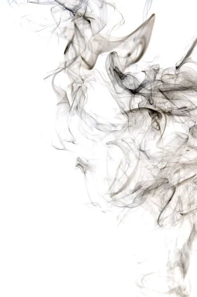 白で隔離される黒い煙 ロイヤリティフリーのストック画像