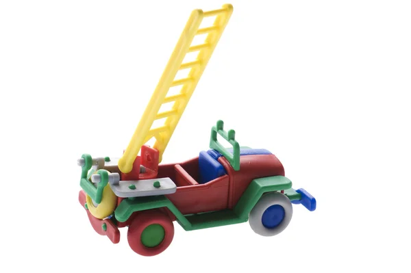Speelgoed brandweerwagen op witte achtergrond — Stockfoto