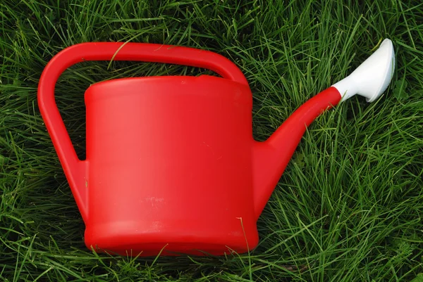 Röd wateringpot — Stockfoto