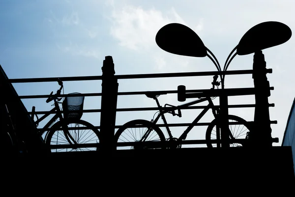 Bikes and the street lamp — Stock Photo, Image