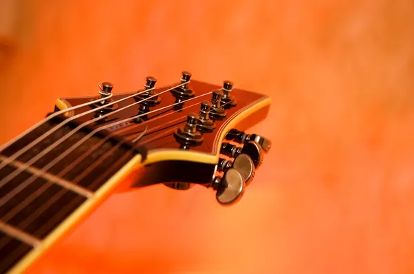 Close-up of the top of a black electric guitar — Stock Photo, Image