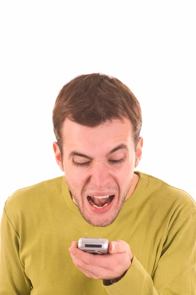 Jonge jongen schreeuwen op de mobiele telefoon. — Stockfoto