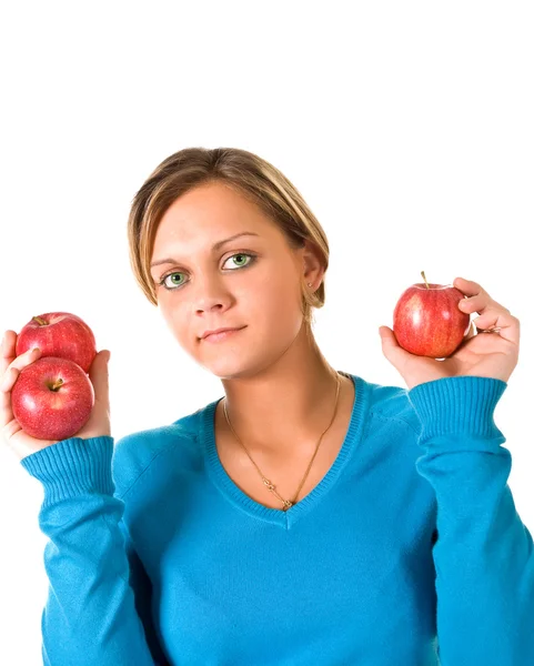 Jovem menina bonita segurando uma maçãs vermelhas — Fotografia de Stock