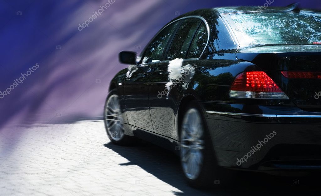 Wedding limo on the abstract background
