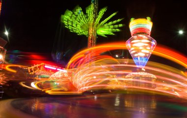 Amusement park at night clipart