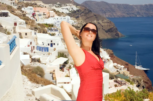 Greek woman on the streets of Oia — Stock Photo, Image